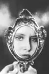 In the mirror. 